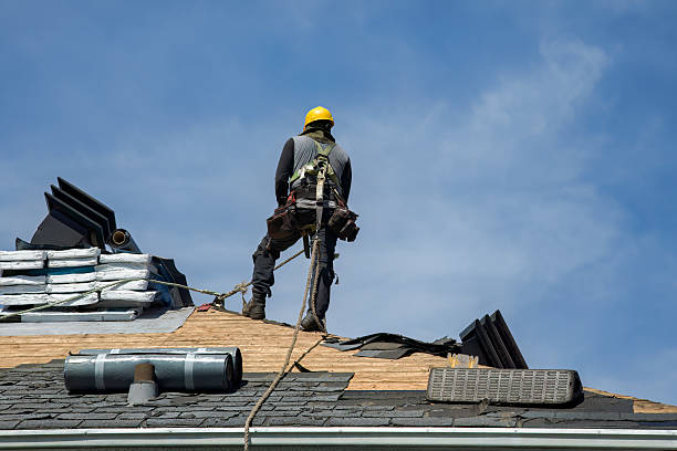 Professional Roof Replacement technician working in Miami, AZ